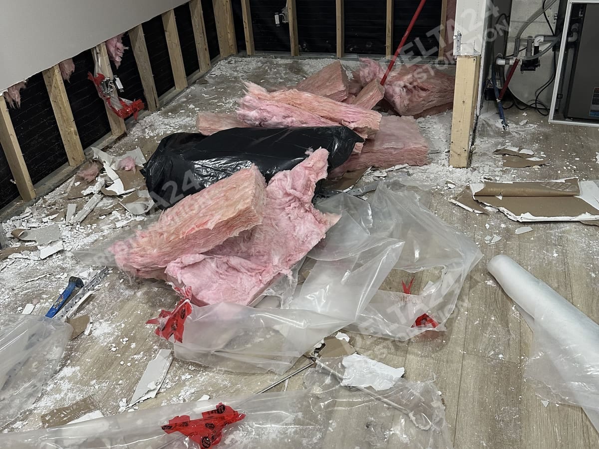 Clearing Out Wet Insulation and Drywall From a Basement